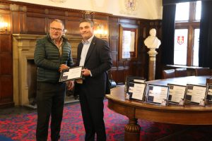 Martin Callaghan receiving his award.